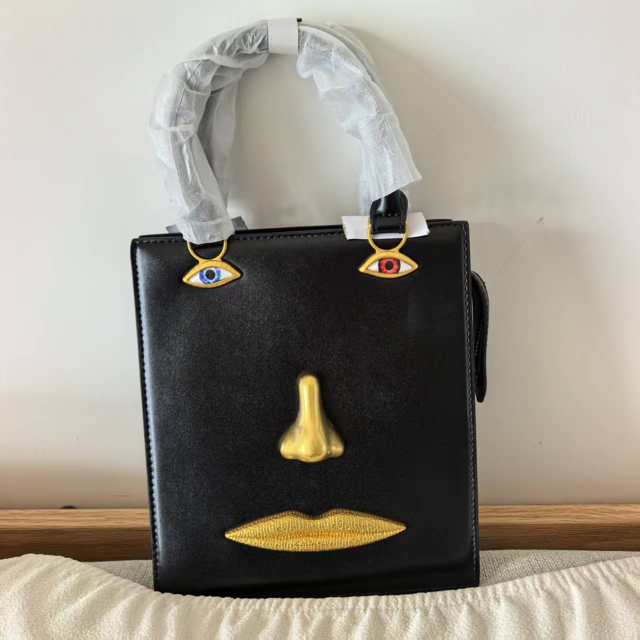 Luxury Designer Human Face Pat – Luxury Bags To Sell Bewertung und Preis